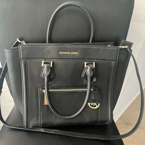 Michael Kors handbag with gold hardware
